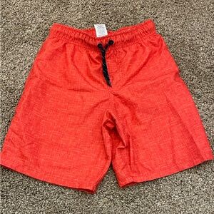 Boys orange swim trunks
